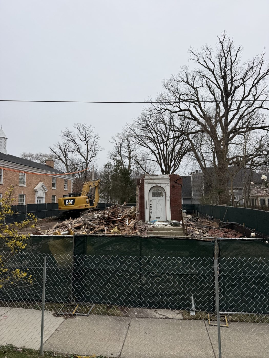 Demolition of the old house on the west side of the property